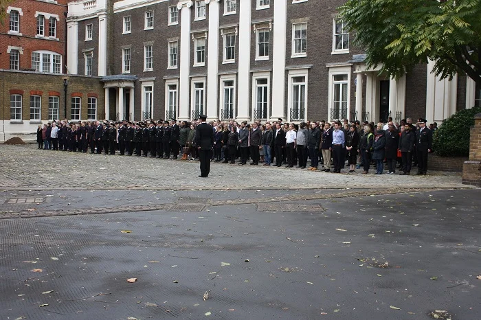 LFB Staff stand outside in rememberance