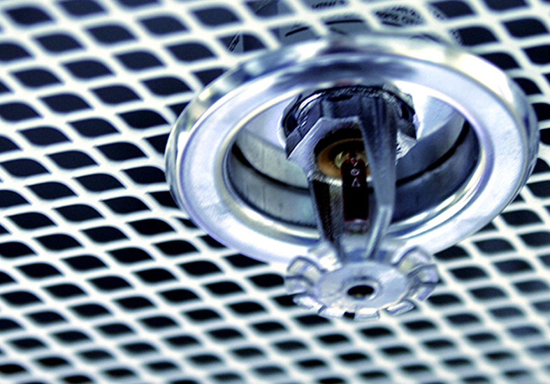 Silver sprinkler on ceiling 