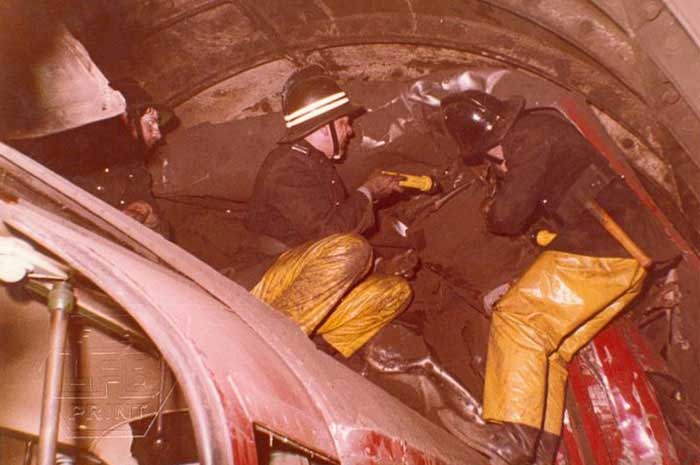 Firefighters at the scene of the tube crash at Moorgate station in 1975