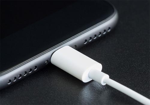 A phone being charged to highlight the dangers of chargers and batteries in the home