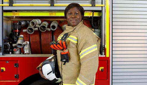 Firefighter and fire engine