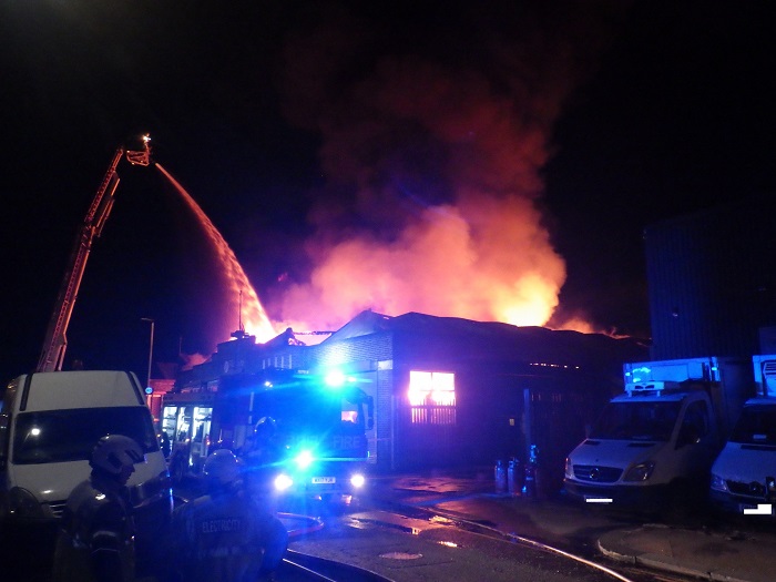 Firefighters tackling the fire.