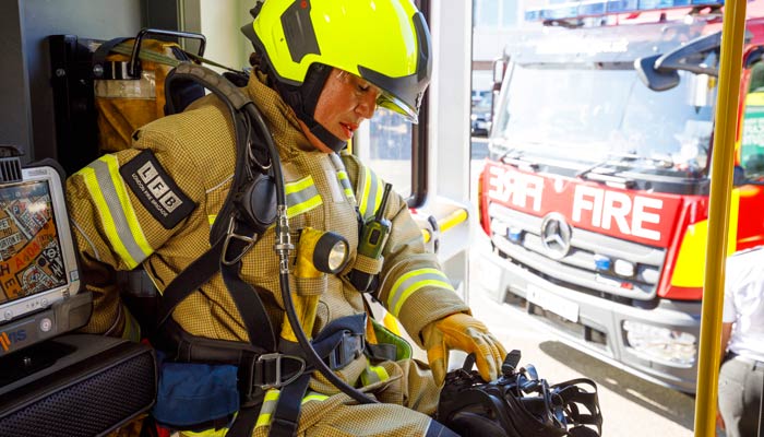Firefighter in fire engine