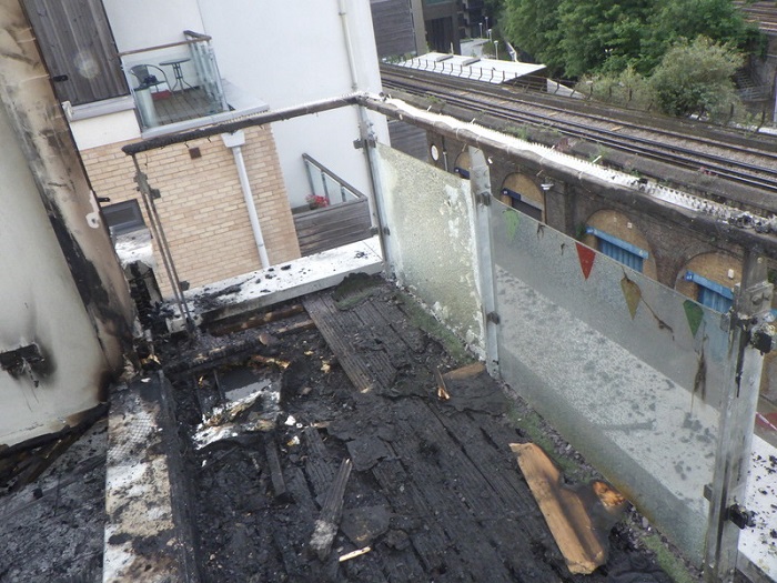 Badly burned balcony on block of flats