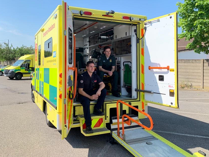 Tom and Jack Binder sitting inside ambulance