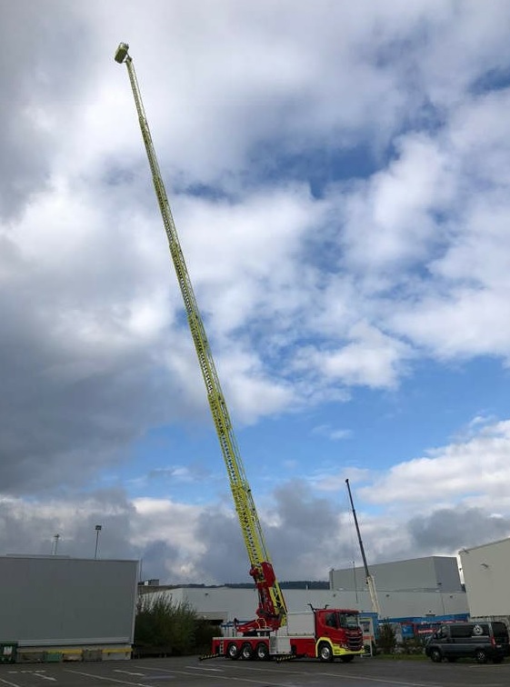 64 metre ladder with the ladder fully extended in the air.