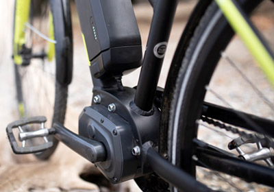 A black and yellow ebike.