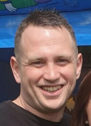 Head shot of Anthony Knott smiling