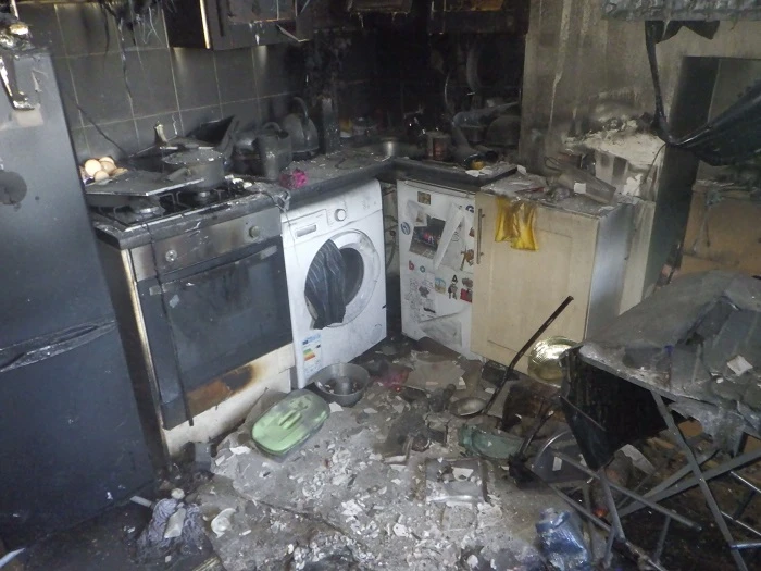 Damage from an E-bike fire in a kitchen
