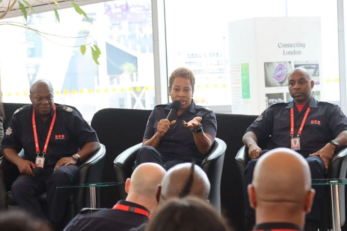 Three LFB senior leaders sitting on chairs talking on a panel