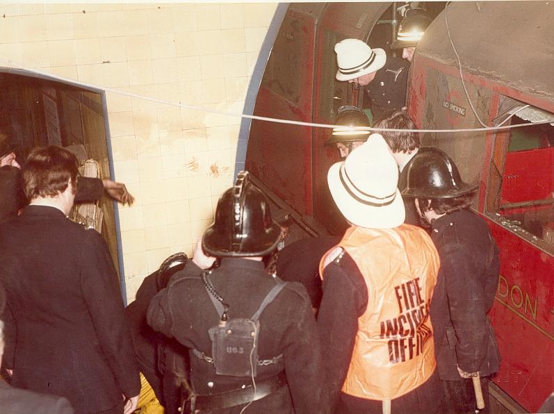 Firefighters at the scene of the tube crash at Moorgate station in 1975