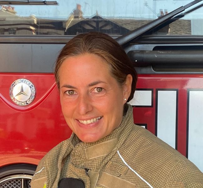 Headshot of Kim Jerray-Silver in front of a fire engine